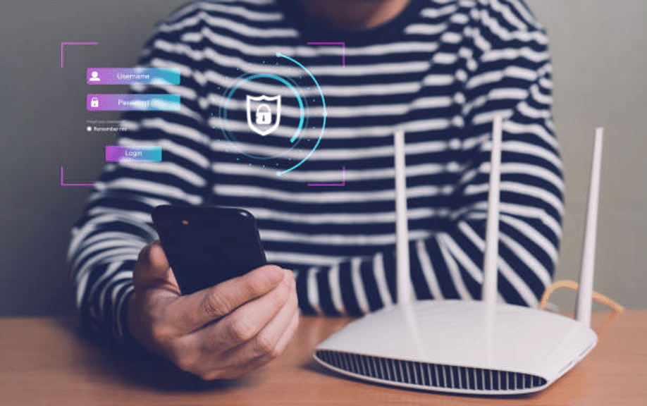 Person securing WiFi router with smartphone login