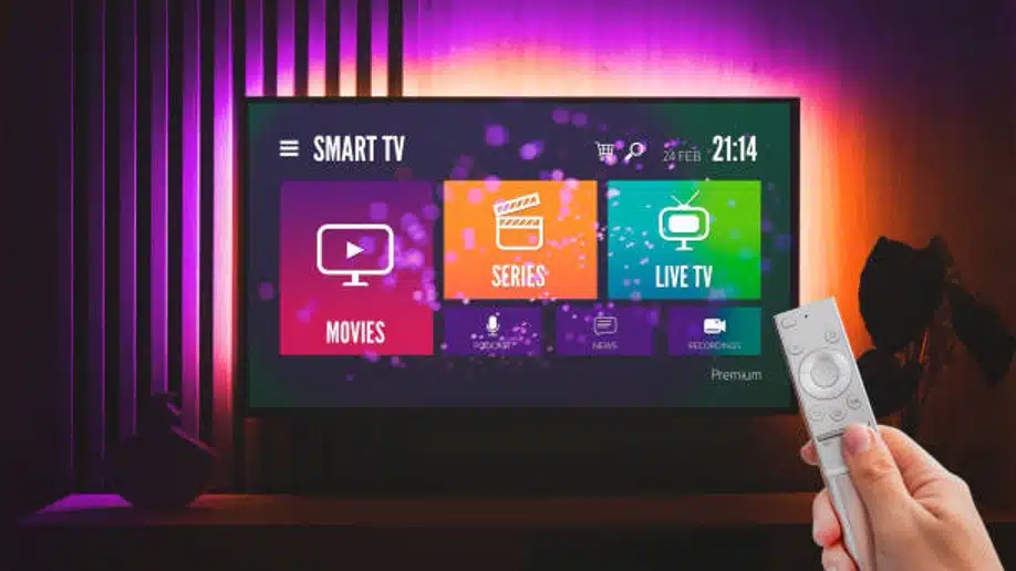 Person using remote with smart TV interface